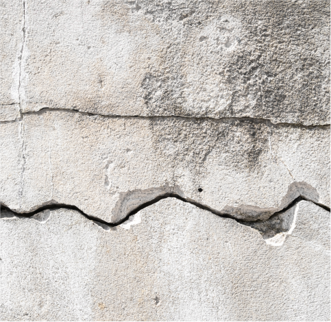 Close up view of a concrete wall before concrete crack repairs